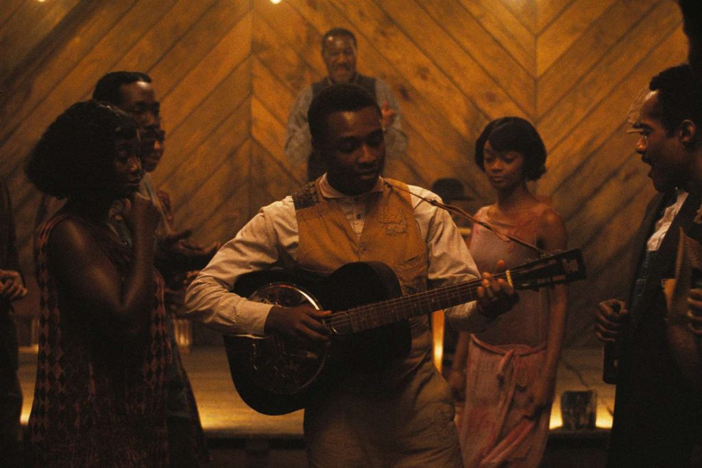 Sammie 'Preacher Boy' Moore entertains the inhabitants of Smoke and Stack's Juke Joint.