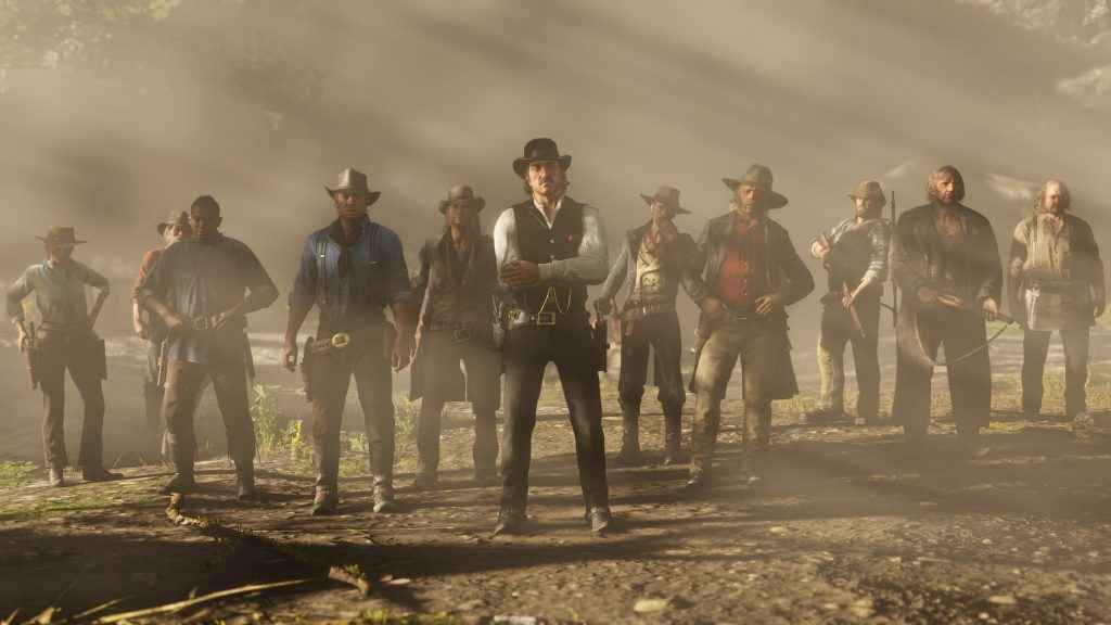 A gang of cowboys and outlaws stand looking forward.
